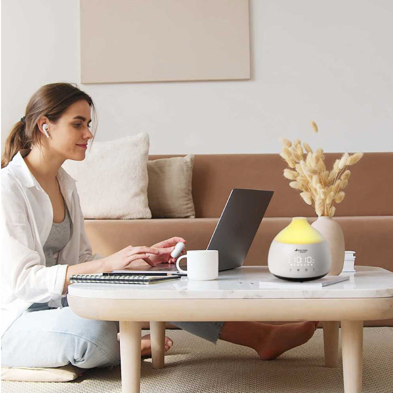 Smart Aroma Diffuser women with laptop using product